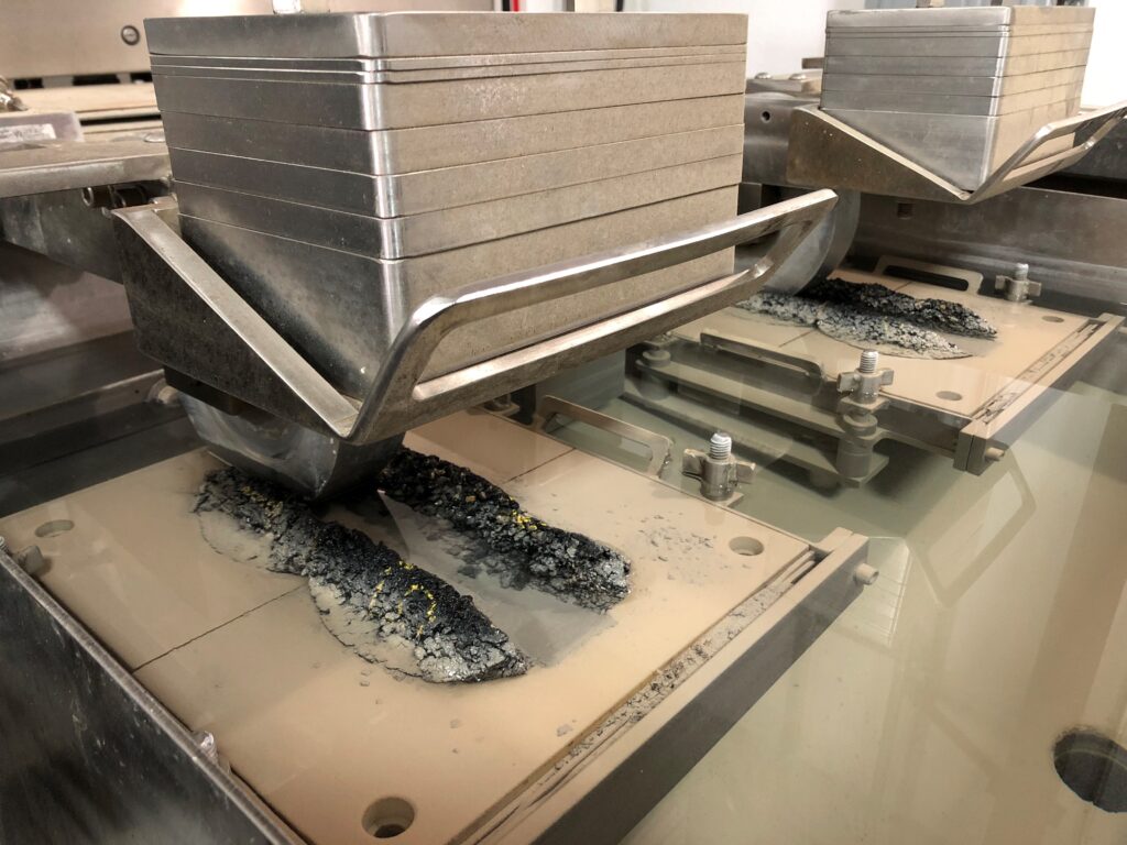 Laboratory equipment performing concrete strength or compression testing